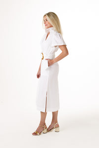A woman modeling a long white dress with short sleeves on a white background